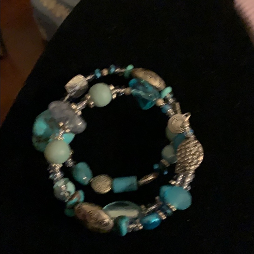 Silver and turquoise wrap bracelet.